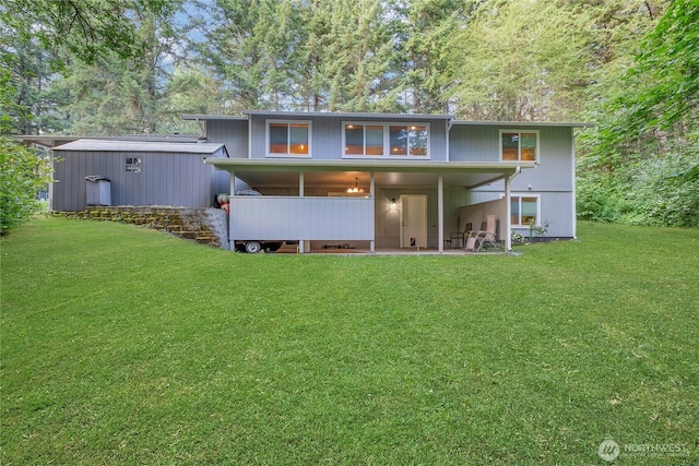 11108 Pilchuck Ct SE, Olympia, WA 98501 - rear view of house featuring a yard and a patio area