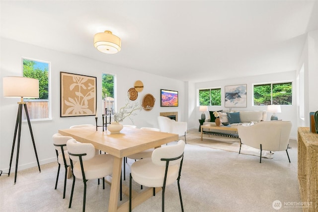20039 99th Ct NE, Bothell, WA 98011 - dining space with light carpet and a tile fireplace