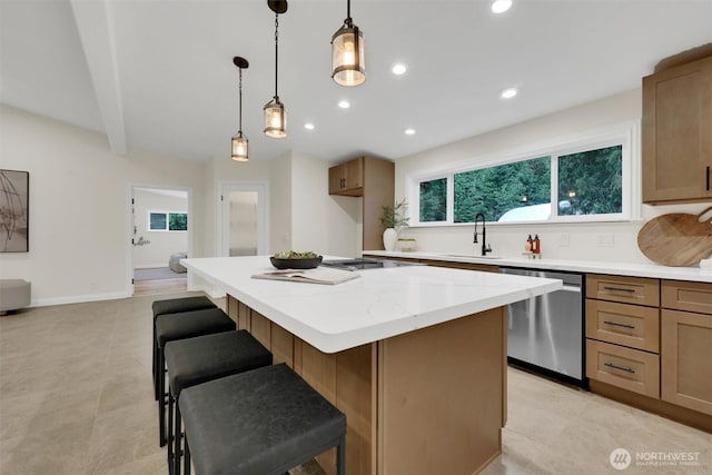 16121 Cedar Grove Rd SE, Issaquah, WA 98027 - kitchen featuring stainless steel dishwasher, plenty of natural light, a center island, a kitchen breakfast bar, and recessed lighting