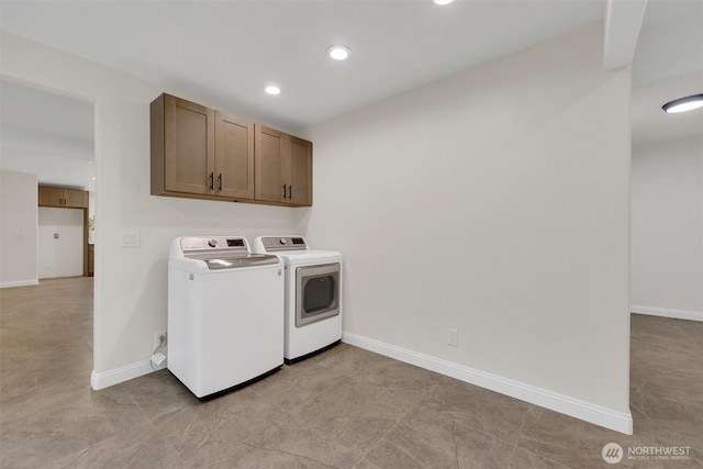 16121 Cedar Grove Rd SE, Issaquah, WA 98027 - laundry room with washer and dryer, recessed lighting, and cabinet space