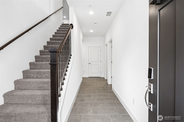 15406 210th Ave E Unit 317, Bonney Lake, WA 98391 - staircase with recessed lighting and baseboards