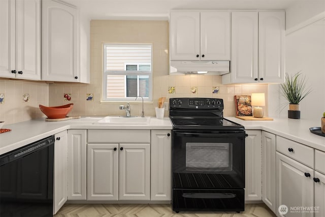 6045 36th Ave SW, Seattle, WA 98126 - kitchen featuring black appliances, under cabinet range hood, white cabinets, and tasteful backsplash