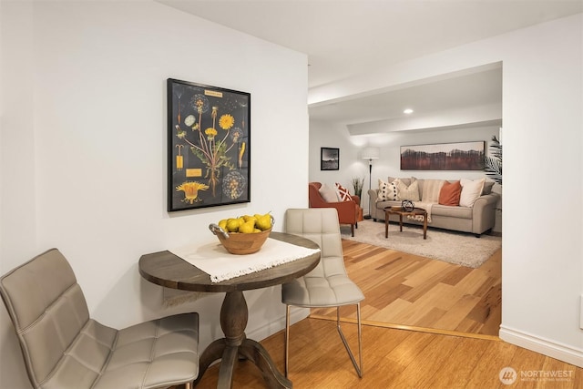 6045 36th Ave SW, Seattle, WA 98126 - dining space with light wood-style floors and baseboards