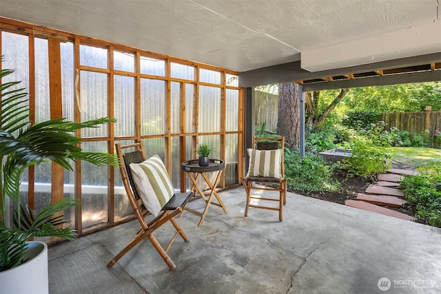 6045 36th Ave SW, Seattle, WA 98126 - sunroom / solarium with unfinished concrete flooring
