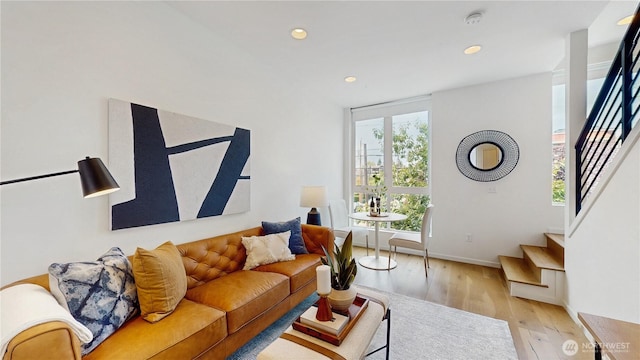 4250 Linden Ave N, Seattle, WA 98103 - living room featuring stairway, recessed lighting, and light wood-style floors