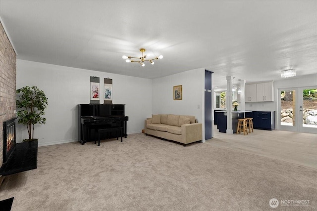 18020 SE 146th St, Renton, WA 98059 - living area with a brick fireplace, light colored carpet, and a chandelier