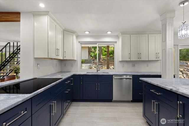 18020 SE 146th St, Renton, WA 98059 - kitchen with stainless steel dishwasher, black electric stovetop, blue cabinetry, white cabinetry, and recessed lighting
