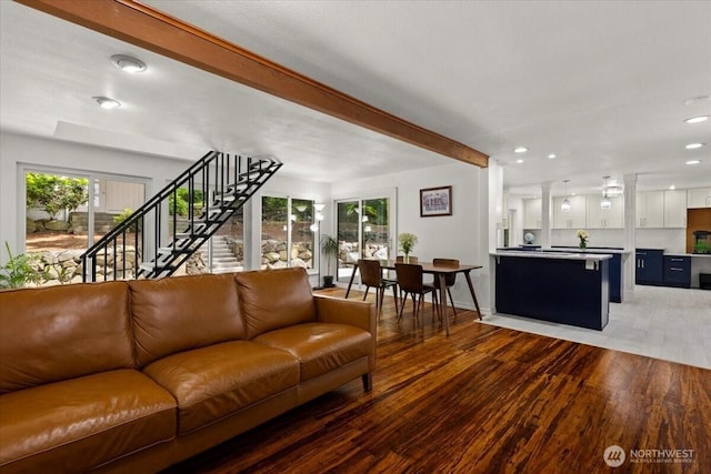 18020 SE 146th St, Renton, WA 98059 - living room with light wood-style flooring, plenty of natural light, beam ceiling, stairway, and recessed lighting