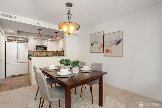 11011 NE 12th St Unit 501, Bellevue, WA 98004 - dining area with light carpet