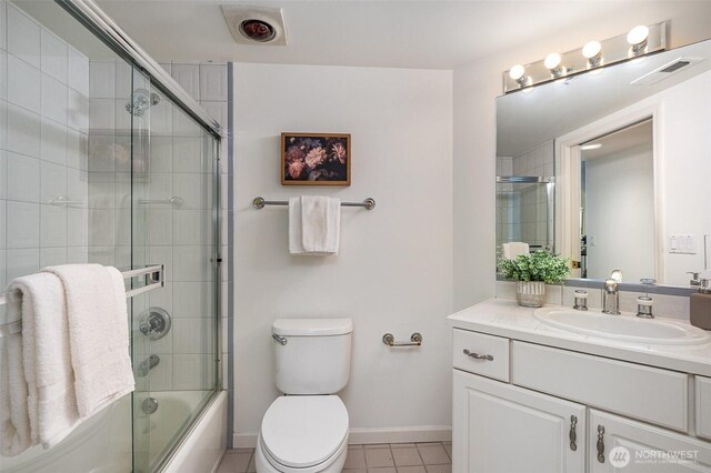 11011 NE 12th St Unit 501, Bellevue, WA 98004 - full bath with tile patterned floors, vanity, and combined bath / shower with glass door