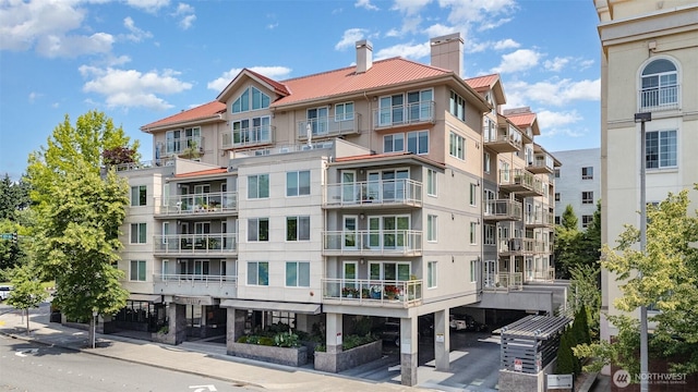 11011 NE 12th St Unit 501, Bellevue, WA 98004 - view of apartment building / complex