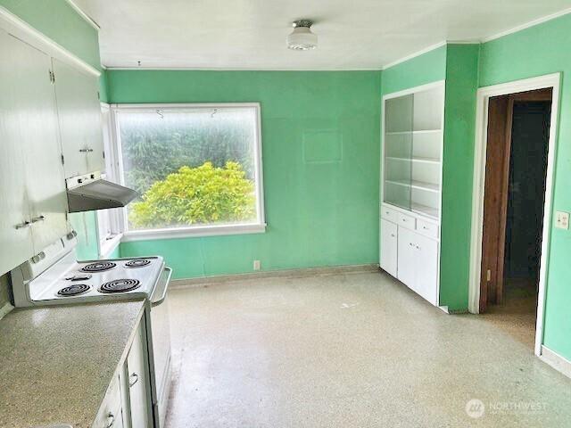 4140 Poplar Way, Longview, WA 98632 - kitchen featuring white electric range oven, exhaust hood, white cabinets, and crown molding