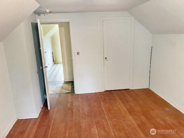 4140 Poplar Way, Longview, WA 98632 - additional living space with hardwood / wood-style floors and lofted ceiling