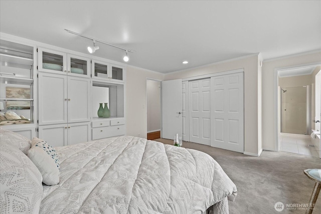 4505 144th Ave SE, Bellevue, WA 98006 - bedroom featuring carpet, a closet, ornamental molding, and rail lighting