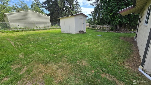 362 Lakeside Dr, Sedro Woolley, WA 98284 - fenced backyard with a storage unit