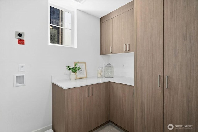 118B 2nd St S, Kirkland, WA 98033 - laundry room with electric dryer hookup and cabinet space