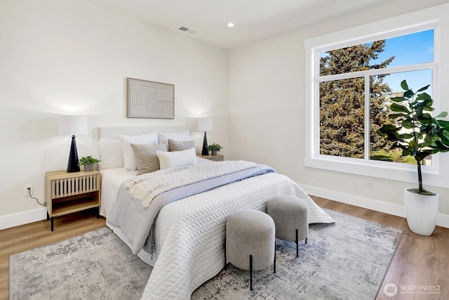 2768 W Wiser Lake Ct, Ferndale, WA 98248 - bedroom with multiple windows, wood finished floors, and recessed lighting