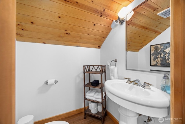 40 Driftwood Shrs, Henry Island, WA 98250 - bathroom featuring vaulted ceiling, wood ceiling, and wood finished floors