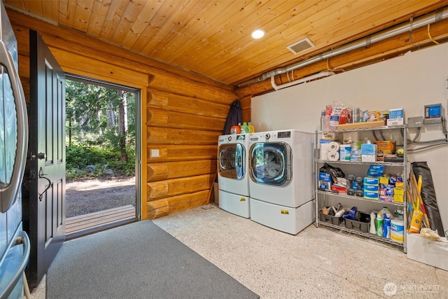 40 Driftwood Shrs, Henry Island, WA 98250 - laundry area featuring independent washer and dryer, wooden ceiling, and log walls