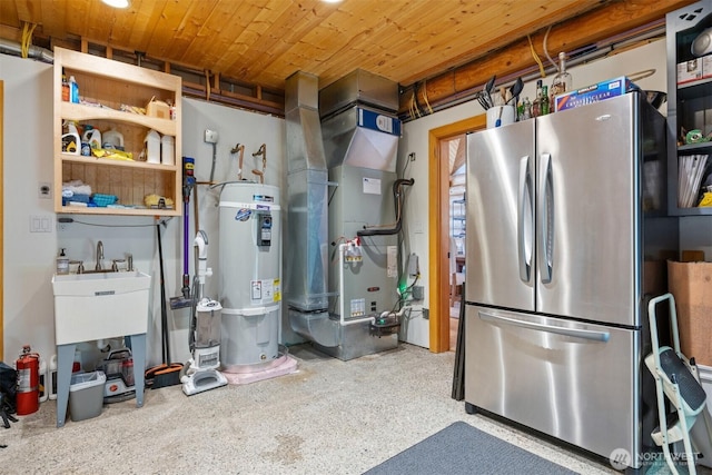 40 Driftwood Shrs, Henry Island, WA 98250 - utility room featuring water heater and heating unit