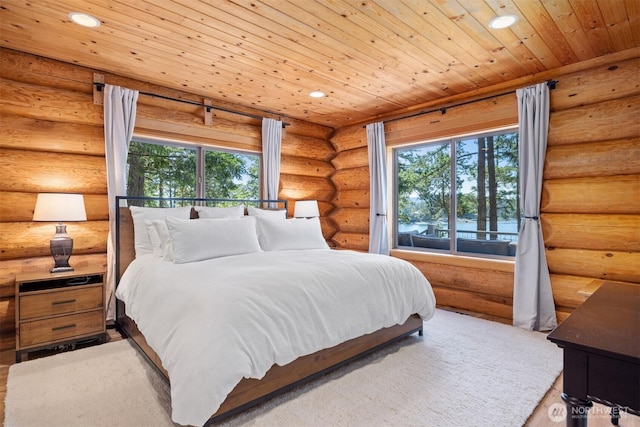 40 Driftwood Shrs, Henry Island, WA 98250 - bedroom featuring recessed lighting, rustic walls, and wooden ceiling