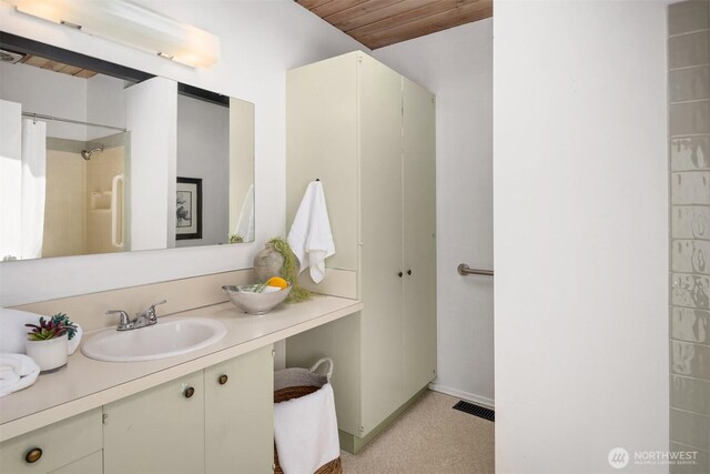 6602 35th St W, University Place, WA 98466 - bathroom with wood ceiling, vanity, and a shower with curtain