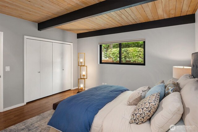 6602 35th St W, University Place, WA 98466 - bedroom with a wooden ceiling with exposed beams, wood finished floors, and a closet