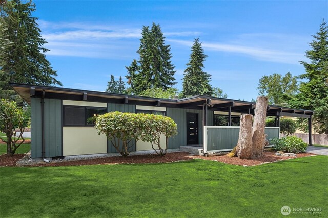6602 35th St W, University Place, WA 98466 - mid-century inspired home featuring a front lawn