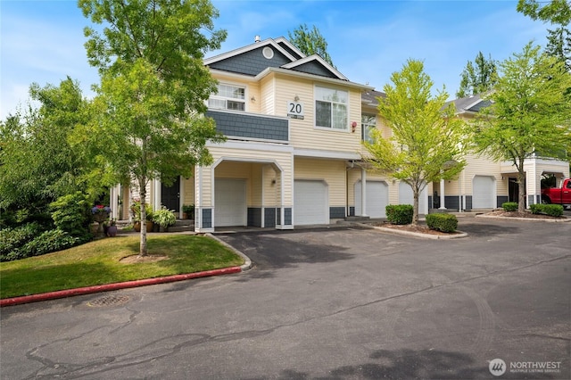 1855 Trossachs Blvd SE Unit 2002, Sammamish, WA 98075 - multi unit property featuring driveway, a garage, and a front lawn
