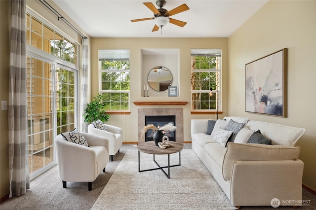 1855 Trossachs Blvd SE Unit 2002, Sammamish, WA 98075 - living area with carpet flooring, ceiling fan, healthy amount of natural light, and a fireplace