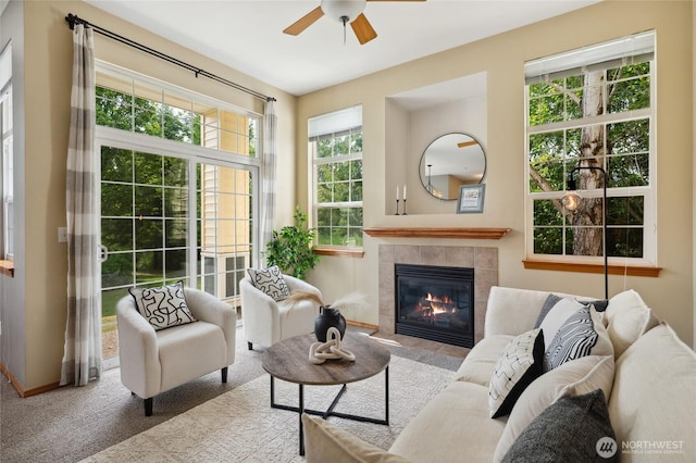 1855 Trossachs Blvd SE Unit 2002, Sammamish, WA 98075 - carpeted living area with ceiling fan and a fireplace