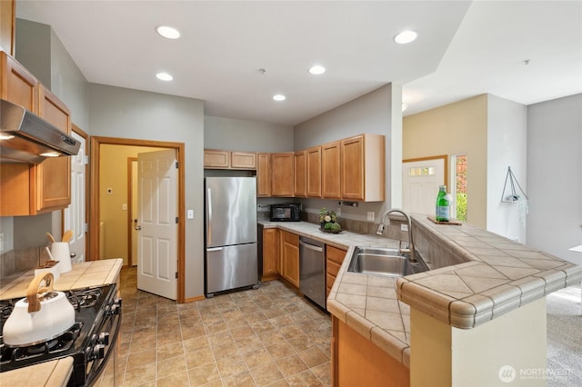 1855 Trossachs Blvd SE Unit 2002, Sammamish, WA 98075 - kitchen with black appliances, range hood, a peninsula, tile countertops, and recessed lighting