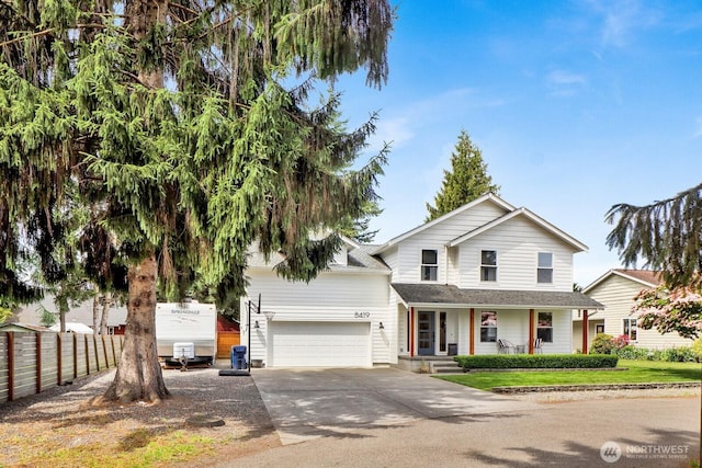 8419 Double Ditch Rd, Lynden, WA 98264 - view of front of home featuring covered porch, concrete driveway, and an attached garage