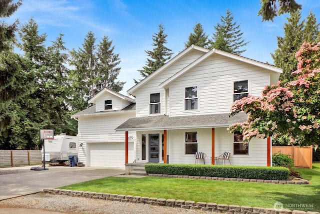 8419 Double Ditch Rd, Lynden, WA 98264 - view of front of home with driveway, covered porch, a shingled roof, and a garage