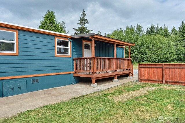 1942 Trigg Rd Unit 38, Ferndale, WA 98248 - back of house with crawl space and a deck