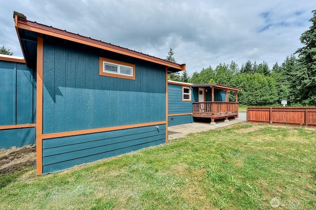 1942 Trigg Rd Unit 38, Ferndale, WA 98248 - view of home's exterior featuring a deck and a metal roof