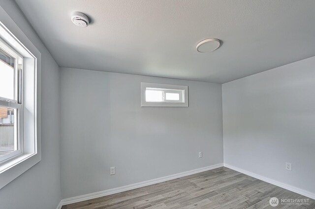 1942 Trigg Rd Unit 38, Ferndale, WA 98248 - spare room featuring a smoke detector and wood finished floors