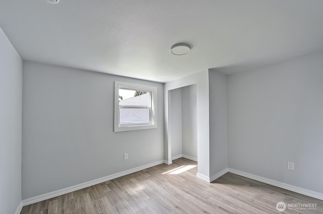 1942 Trigg Rd Unit 38, Ferndale, WA 98248 - unfurnished bedroom featuring wood finished floors and a closet