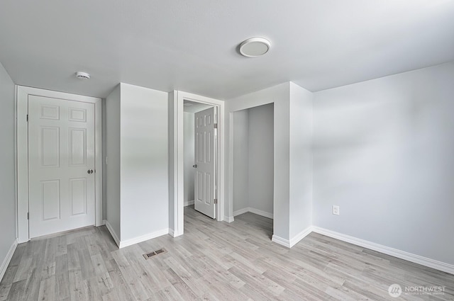 1942 Trigg Rd Unit 38, Ferndale, WA 98248 - unfurnished bedroom with light wood-type flooring and a closet