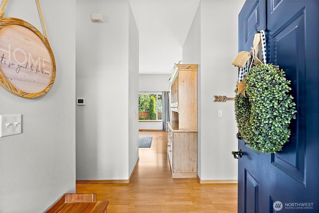 209 Groff Ave NW, Orting, WA 98360 - foyer featuring light wood-type flooring and baseboards