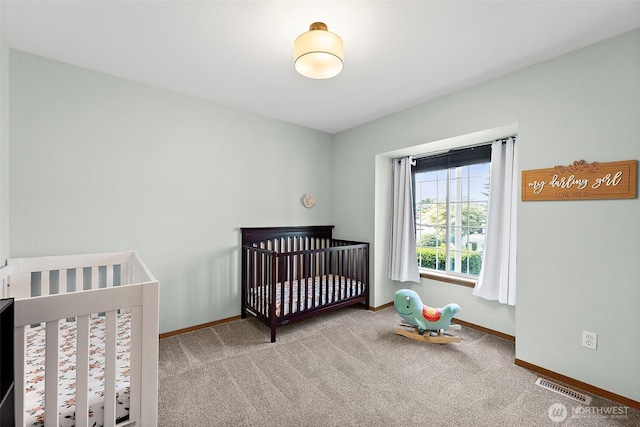 209 Groff Ave NW, Orting, WA 98360 - carpeted bedroom featuring baseboards