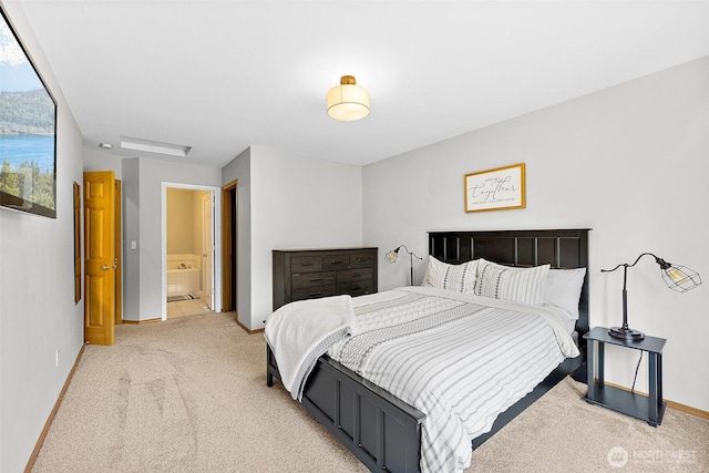 209 Groff Ave NW, Orting, WA 98360 - bedroom featuring light colored carpet and connected bathroom