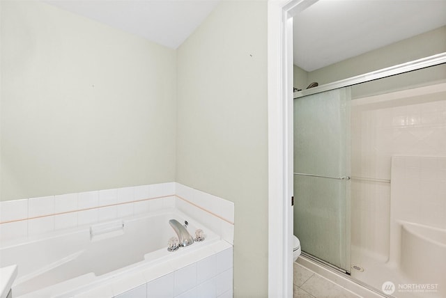 209 Groff Ave NW, Orting, WA 98360 - bathroom featuring a bath, a shower stall, and tile patterned flooring