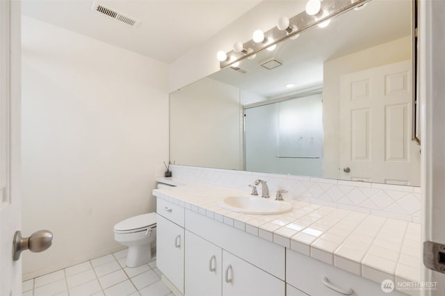 4714 Fairwood Blvd NE Unit 201, Tacoma, WA 98422 - full bathroom featuring vanity, an enclosed shower, and tile patterned floors