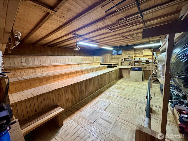 4714 Fairwood Blvd NE Unit 201, Tacoma, WA 98422 - bar featuring wooden walls, light wood-type flooring, and wooden ceiling