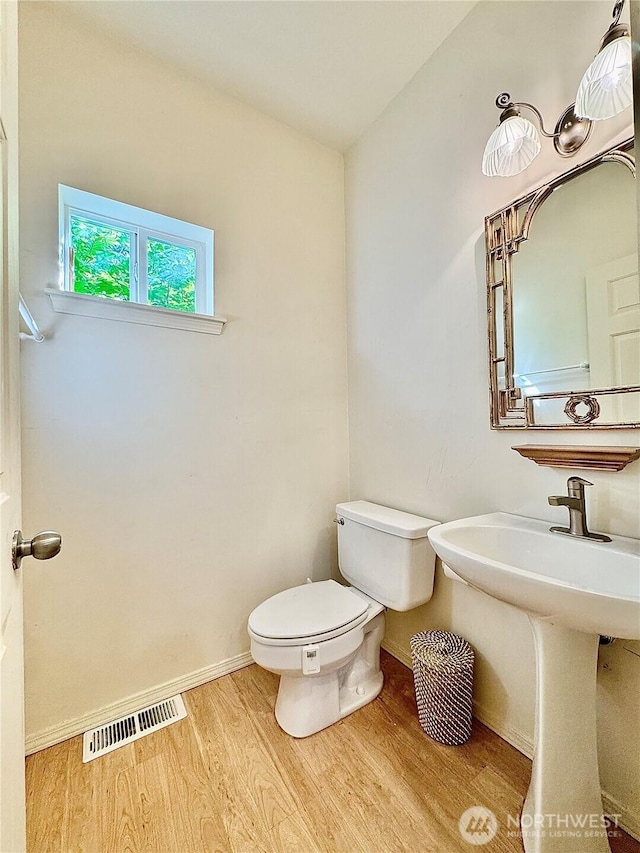 4714 Fairwood Blvd NE Unit 201, Tacoma, WA 98422 - bathroom with wood finished floors and toilet