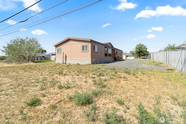 1303 Craig St W, Moses Lake, WA 98837 - back of house with crawl space