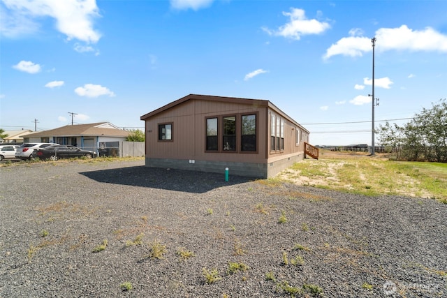 1303 Craig St W, Moses Lake, WA 98837 - view of home's exterior with crawl space