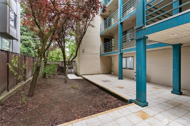 3256 SW Avalon St Unit 304, Seattle, WA 98126 - patio / terrace with a fenced backyard and a patio area