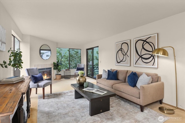3256 SW Avalon St Unit 304, Seattle, WA 98126 - living area featuring carpet flooring and a fireplace